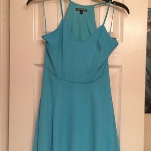 Fitted teal with flare at thigh dress